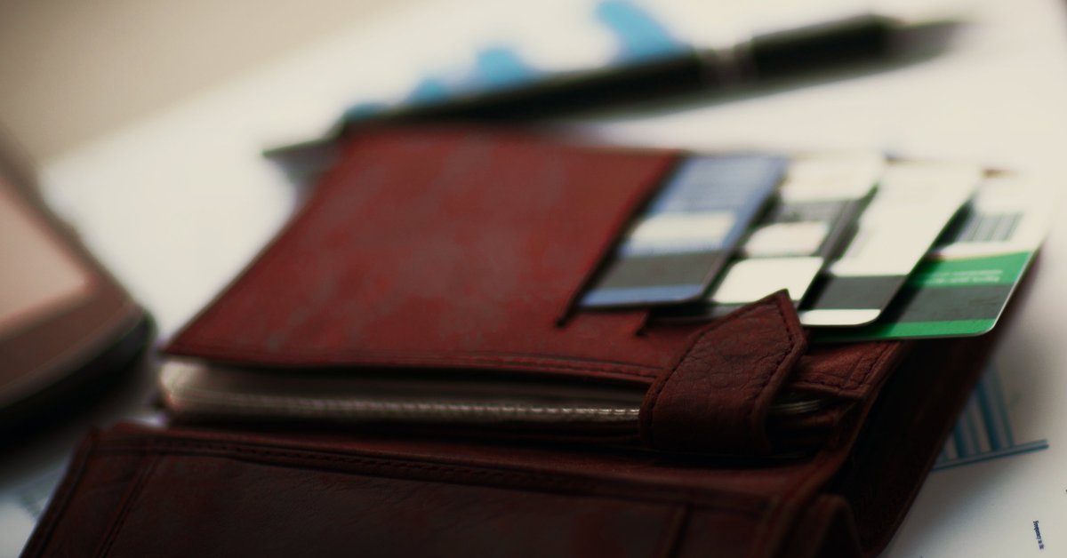 Wallet sitting open showing credit cards