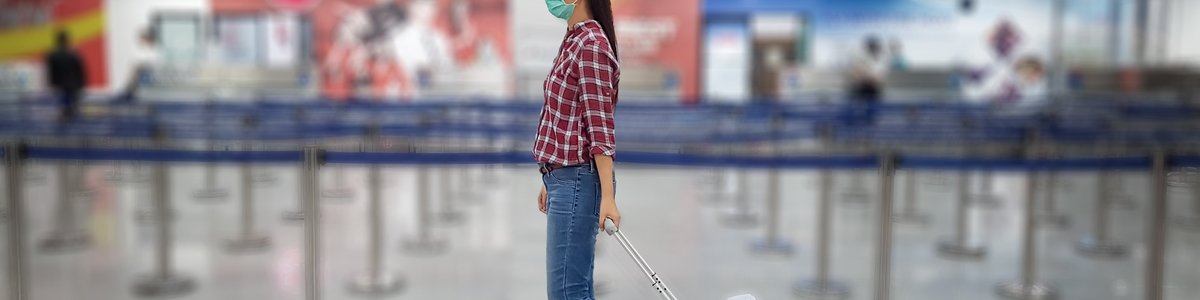 Girl In Mask At Airport