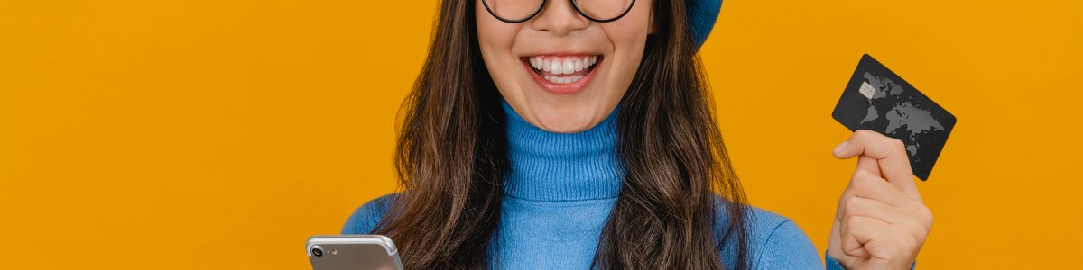 Girl With Glasses and Credit Card