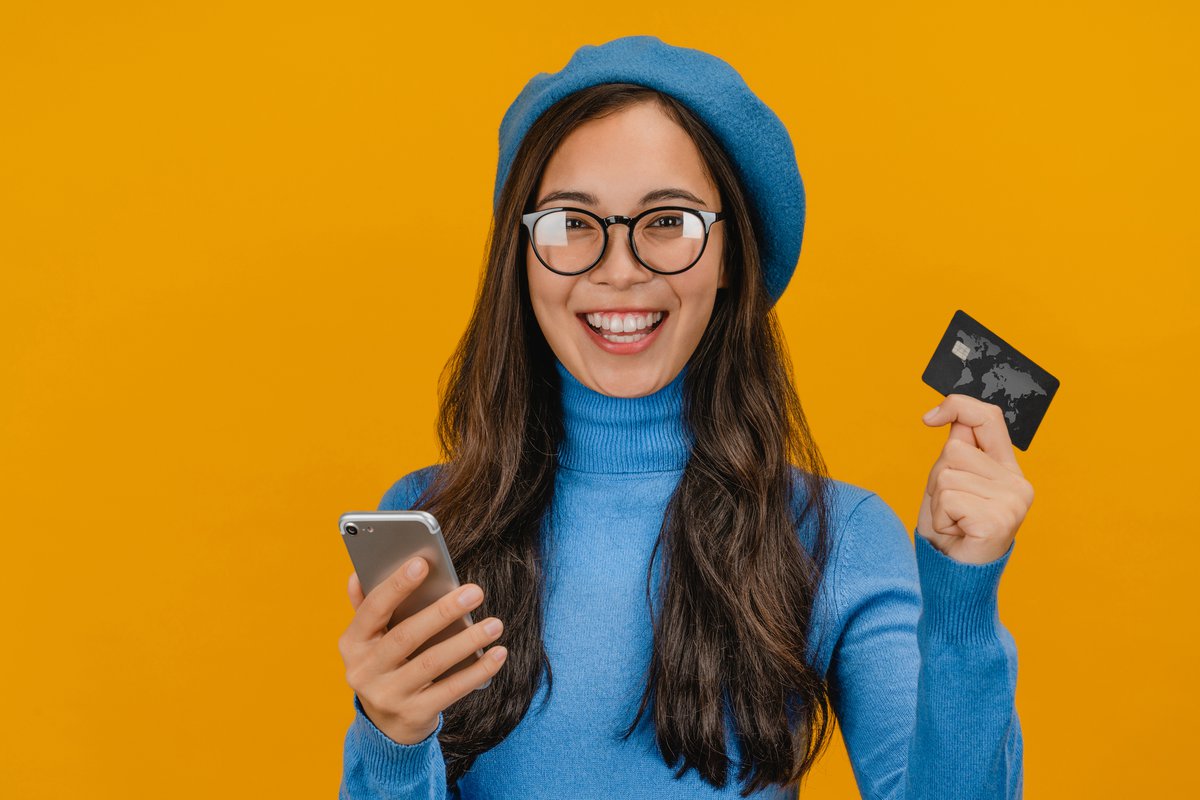 Girl With Glasses and Credit Card