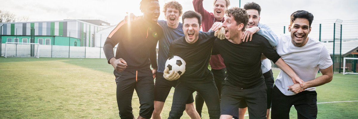 Group of adult male soccer players on a field