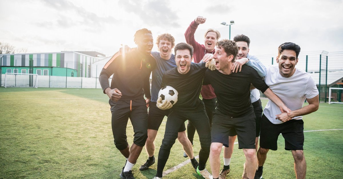 Group of adult male soccer players on a field