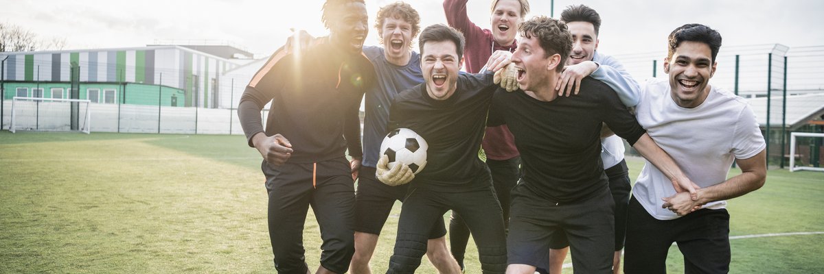 Group of adult male soccer players on a field