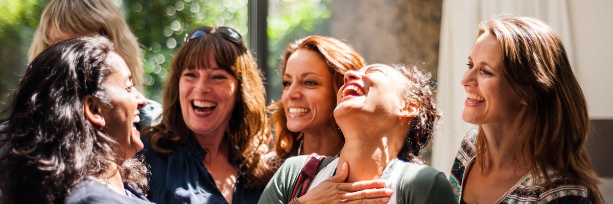 Group of women having an enjoyable interaction.