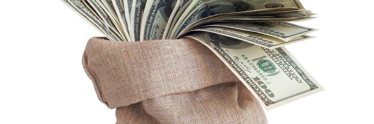 Burlap bag filled with $100 bills.