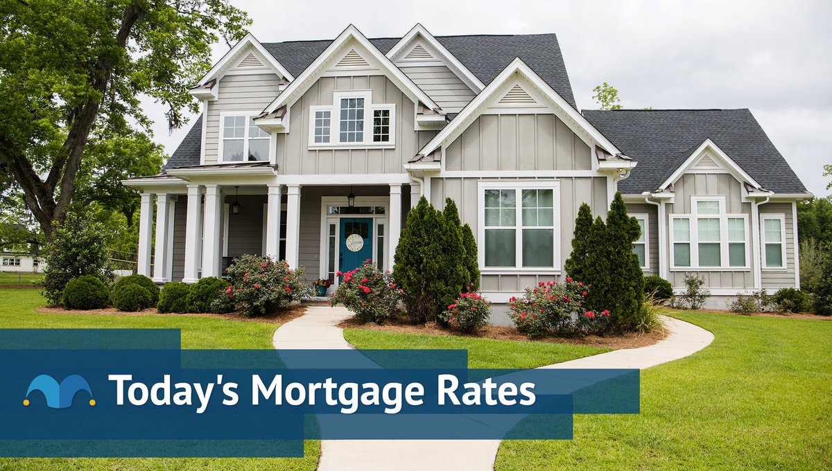 Large modern style home with today's mortgage rates chart.
