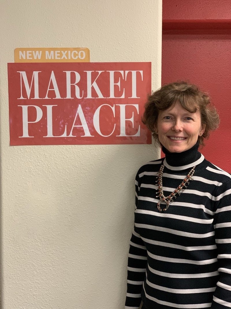 Rena Reiser standing in front of the New Mexico MarketPlace offices.