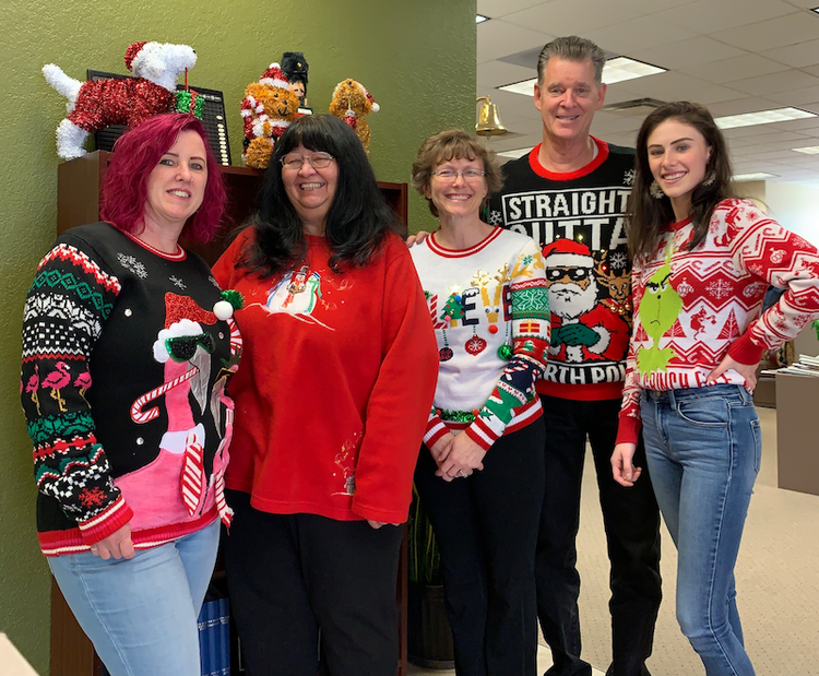 New Mexico MarketPlace/New Mexico Woman staff on ugly sweater day.