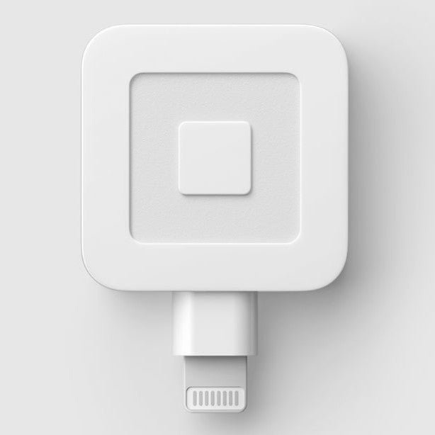 The Square portable credit card reader can be attached to a smartphone to process sales.