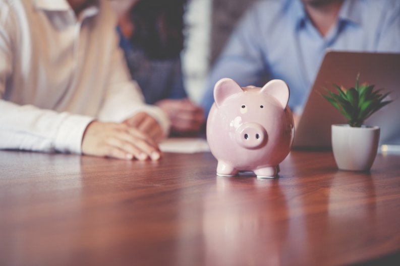 People With Piggy Bank