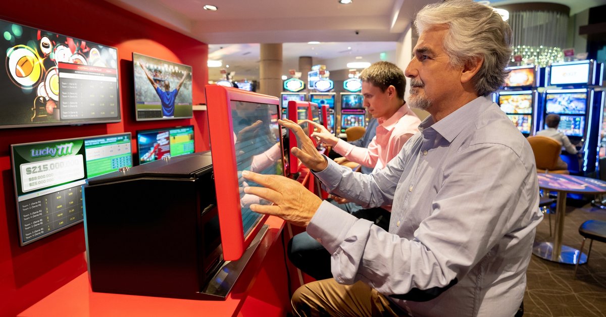 People partaking in sports gambling