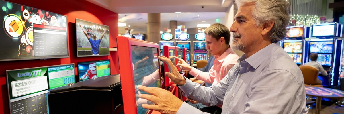 People partaking in sports gambling