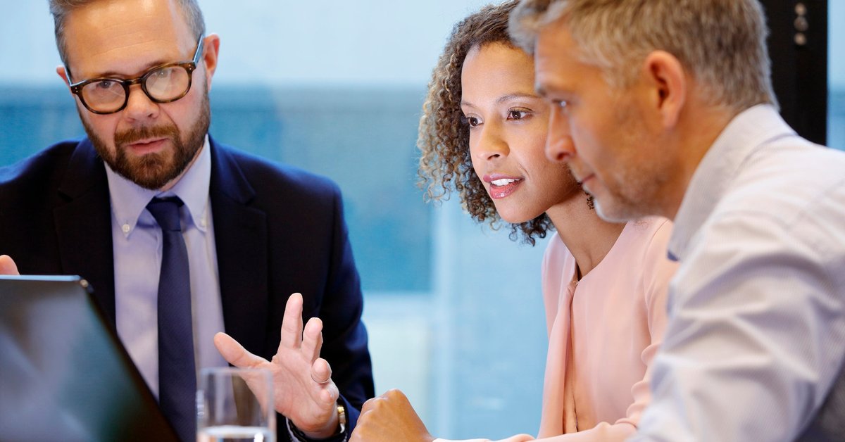 Professional male meeting with couple.