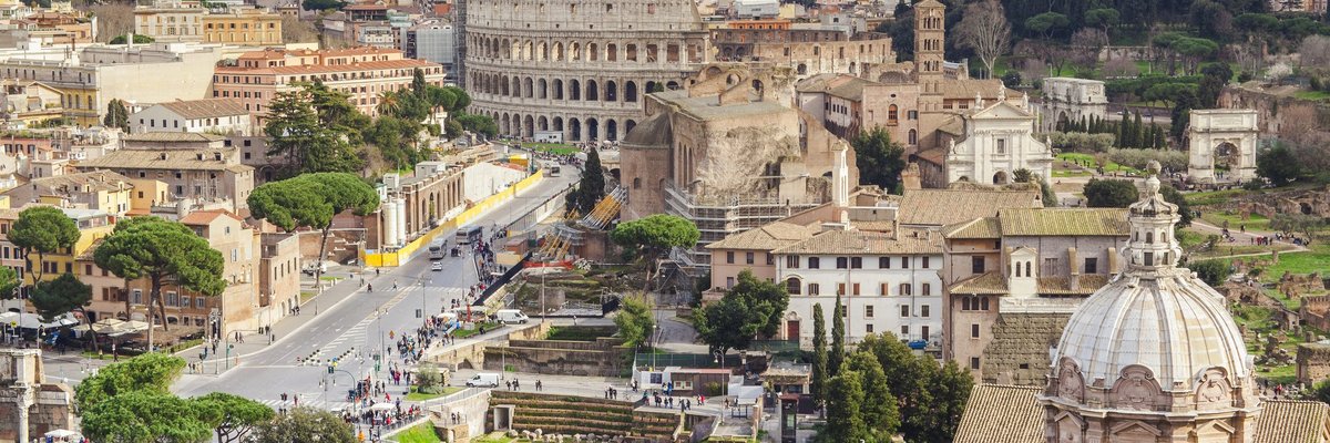 An aerial view of Rome and the Coliseum.