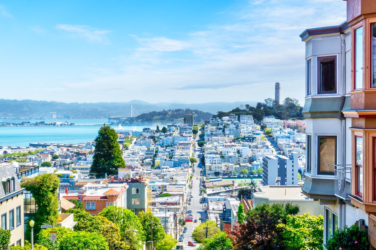 San Francisco apartments overlooking the hills and the Bay on a sunny day.