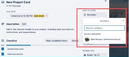 Trello card with member drop down menu to select person to join card