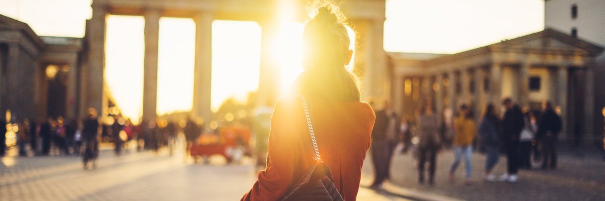 Silhouette of woman in front of German tourist site in Berlin.