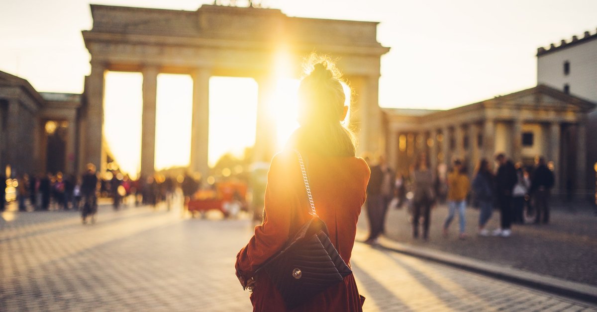 Silhouette of woman in front of German tourist site in Berlin.