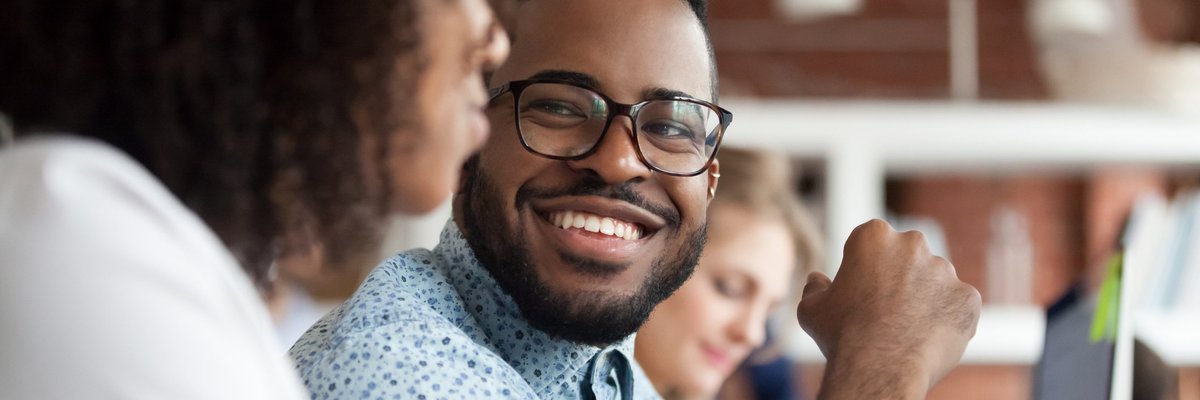 Smiling coworkers in an office.