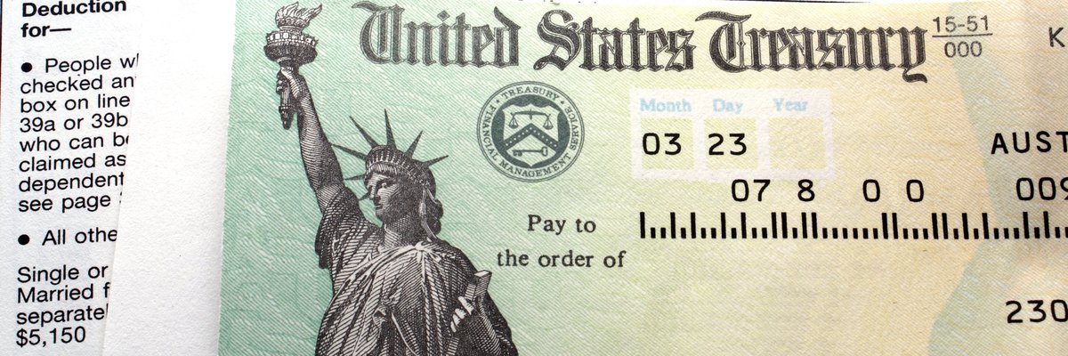 A tax check on top of tax forms.