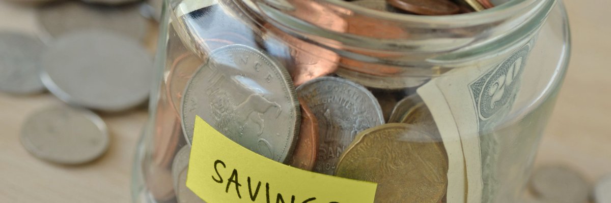 Jar Of Money With "Savings" Label