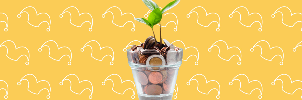 A pot of change with a plant growing out of it