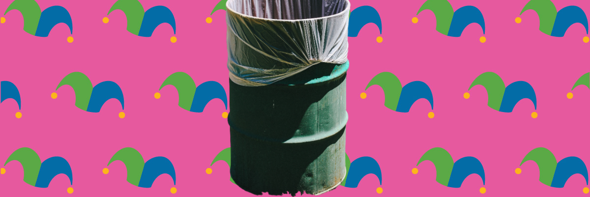 A trash can over a bright background covered in jester caps
