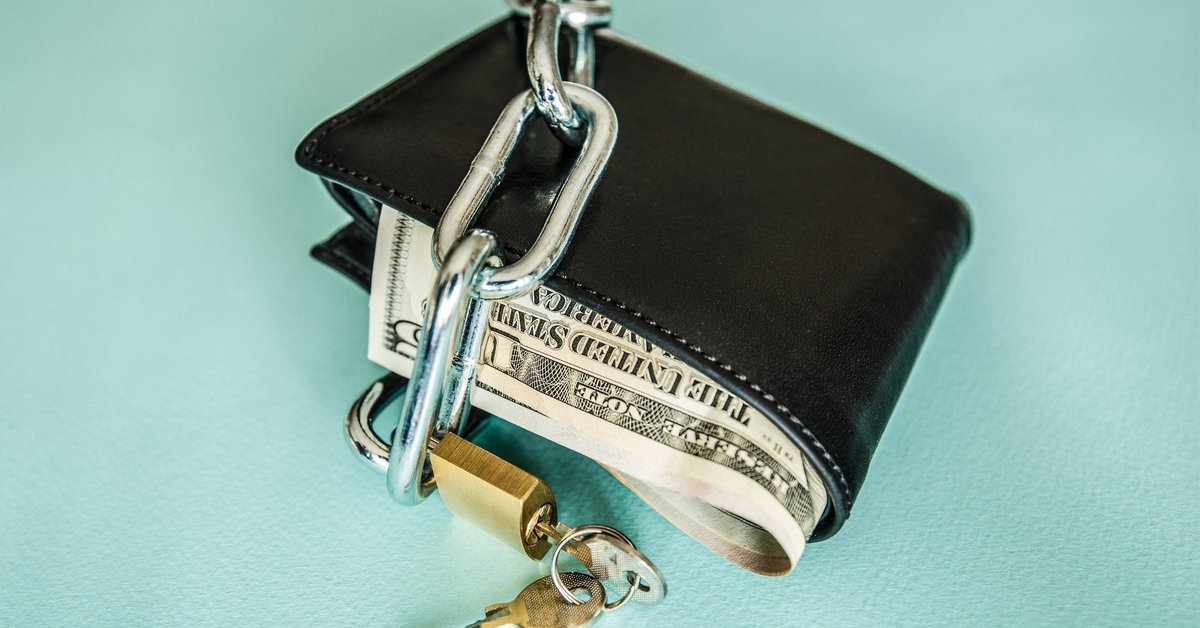 A wallet in chains.