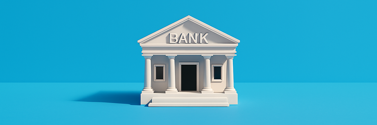 White bank building on blue background.