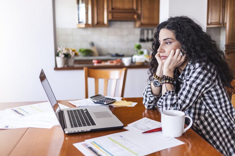 Woman Looking At Laptop