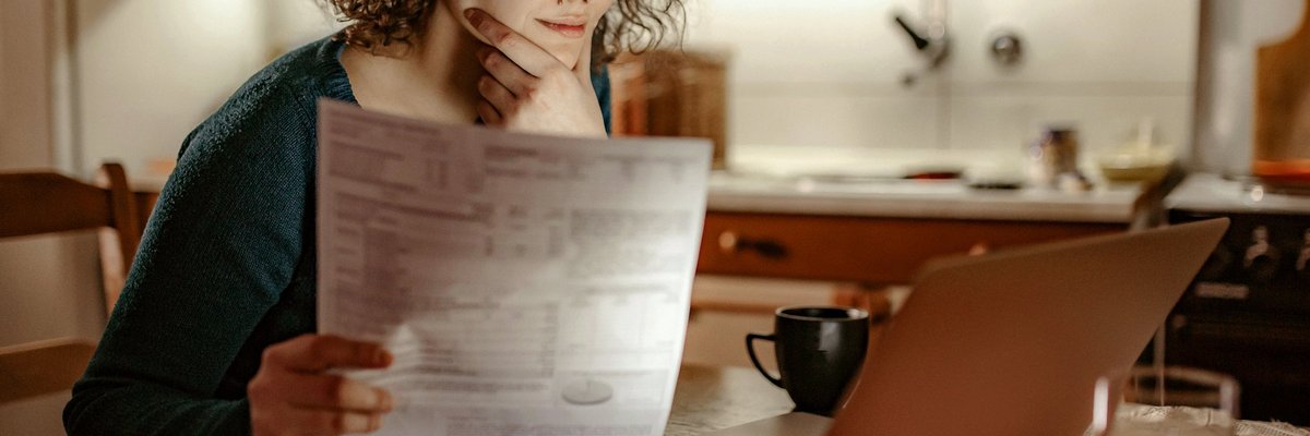 Woman Smiling With Bill