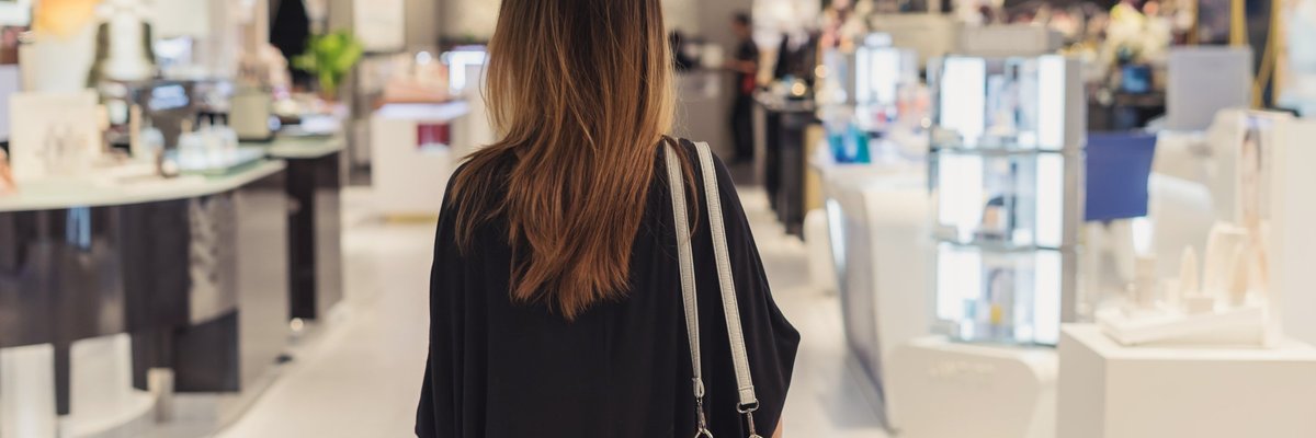 A woman shopping in a department store.