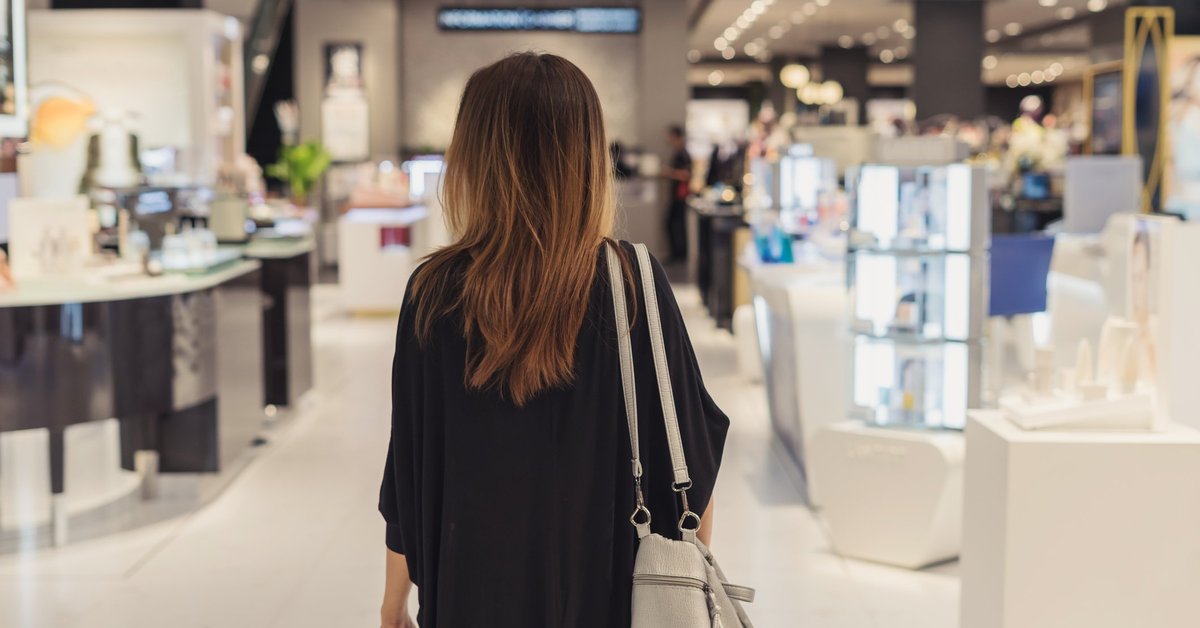 A woman shopping in a department store.