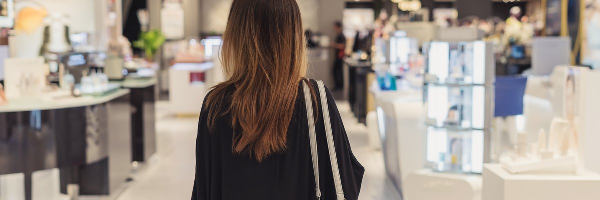 A woman shopping in a department store.