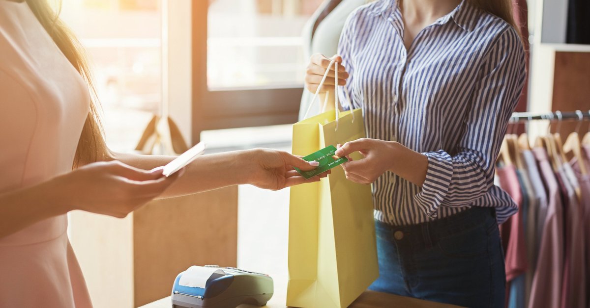 Woman shopping with credit card