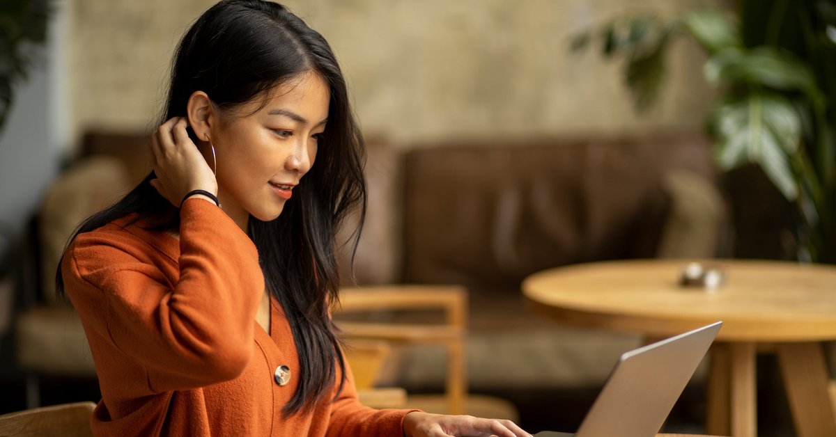 Young woman using her laptop.