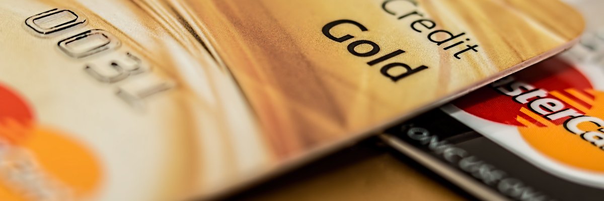 Visa and MasterCard credit cards sitting in a pile