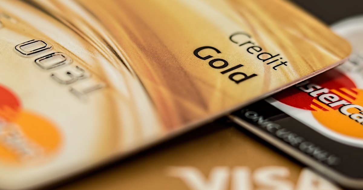Visa and MasterCard credit cards sitting in a pile