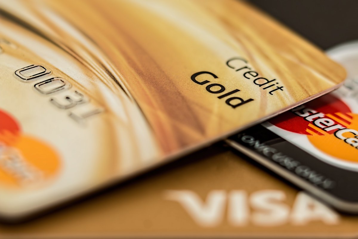 Three credit cards on top of each other.
