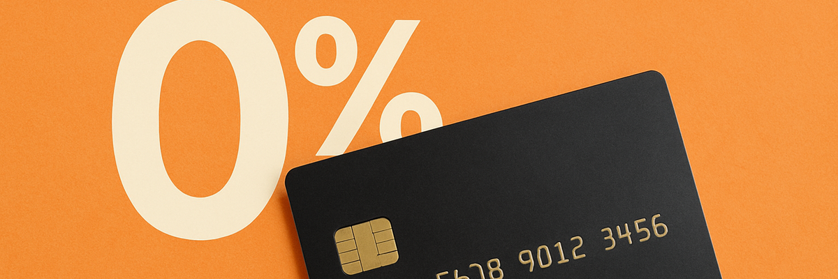A black 0 percent APR credit card against orange background.