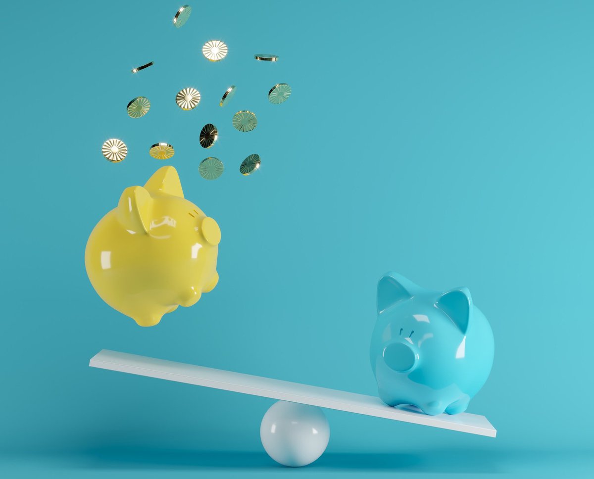 blue piggy bank sending yellow piggy bank flying off a seesaw -- savings account money
