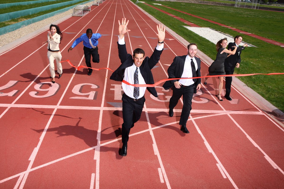 business people finishing a race