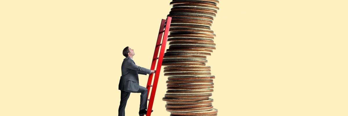 Man in suit using ladder to climb a tall stack of coins with a percentage sign at the top.