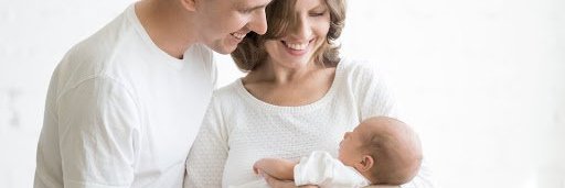 young couple and new baby