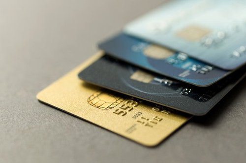 A stack of four credit cards