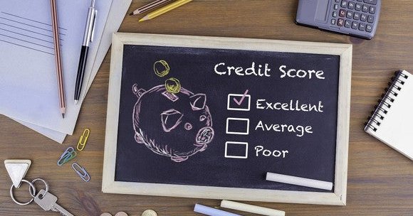 photo of a chalkboard with credit scores