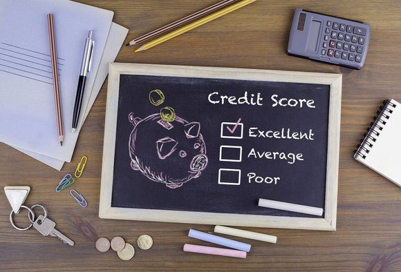 photo of a chalkboard with credit scores
