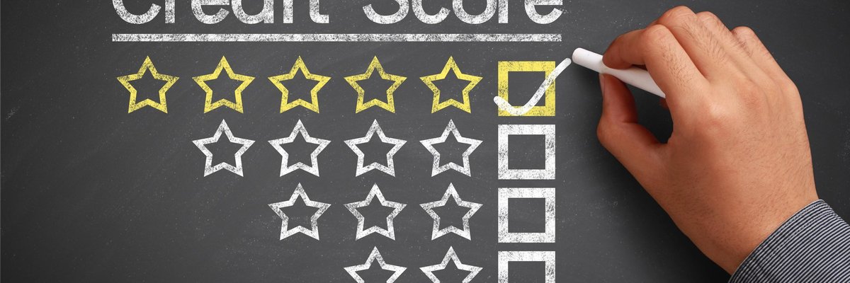 Chalkboard that says Credit Score with decreasing levels of stars and a hand checking the box next to 5 stars