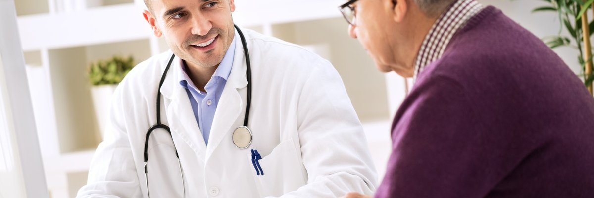 Doctor talking to older patient. 