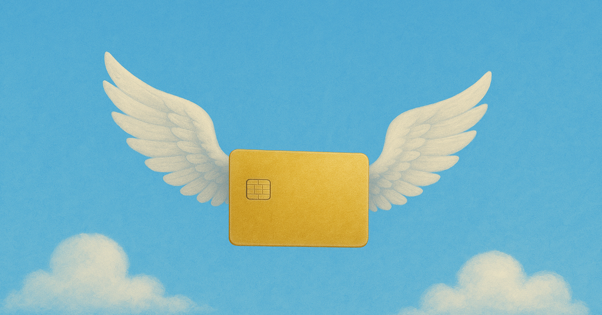 A gold credit card with wings in blue sky.